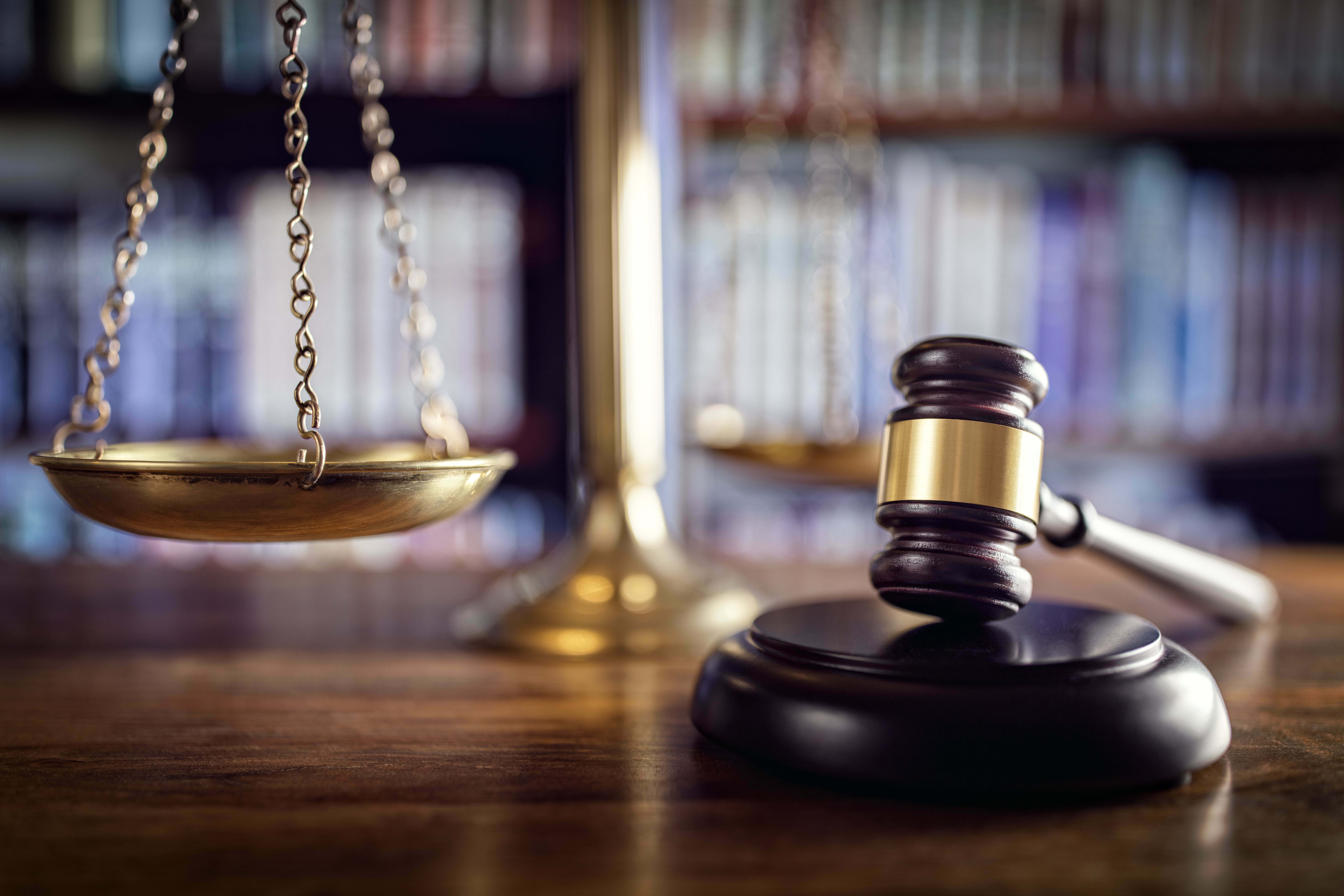 Scales of justice and gavel representing legal guidance and workers’ compensation tips