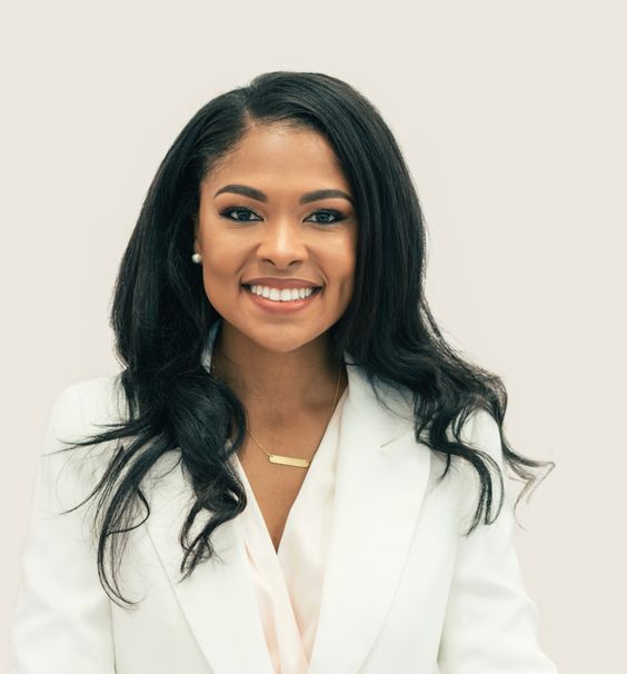 Emily Curtis, Celebrity Exchange content editor, smiling portrait