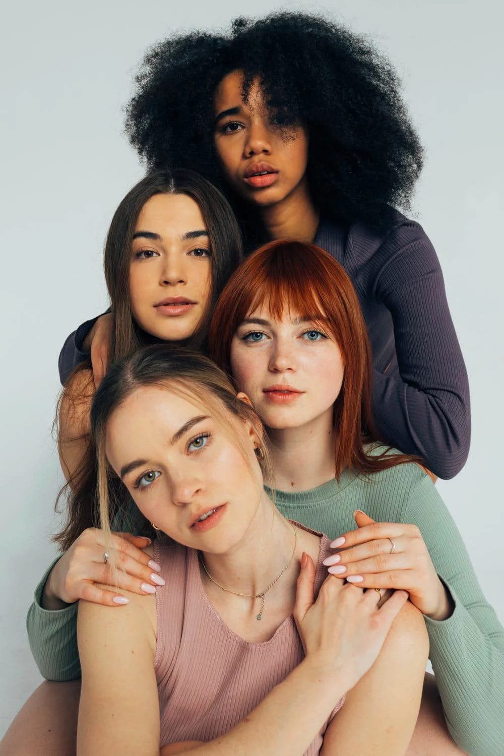 a group of women posing for a photo